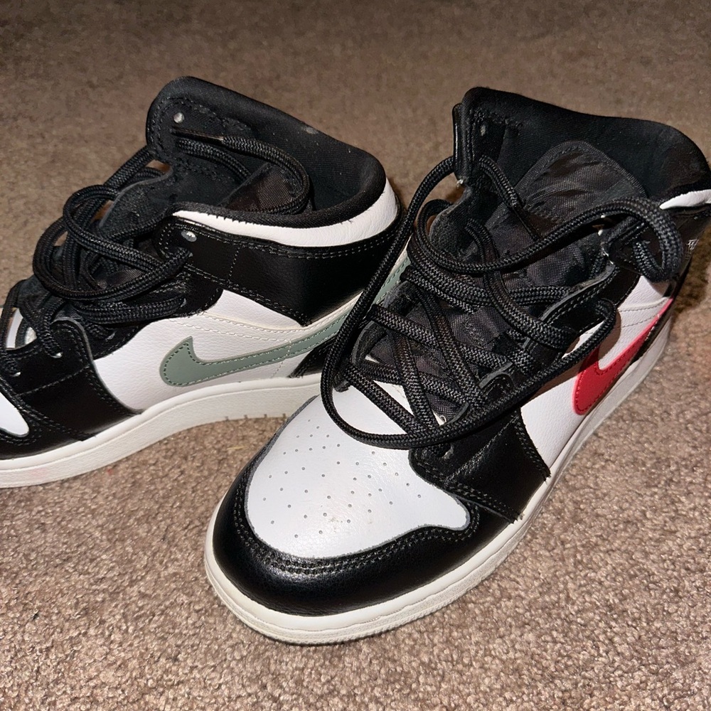 Multi color swoosh Nike Jordans
